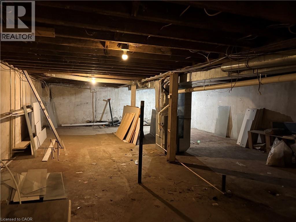 Unfinished below grade area featuring heating unit - 774 Barton Street E, Hamilton, ON