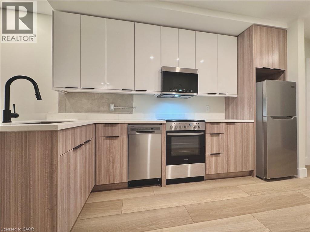 DISHWASHER, STOVE, RANGE MICROWAVE & FRIDGE - 169 James Street S Unit# 401, Hamilton, ON - Indoor Photo Showing Kitchen