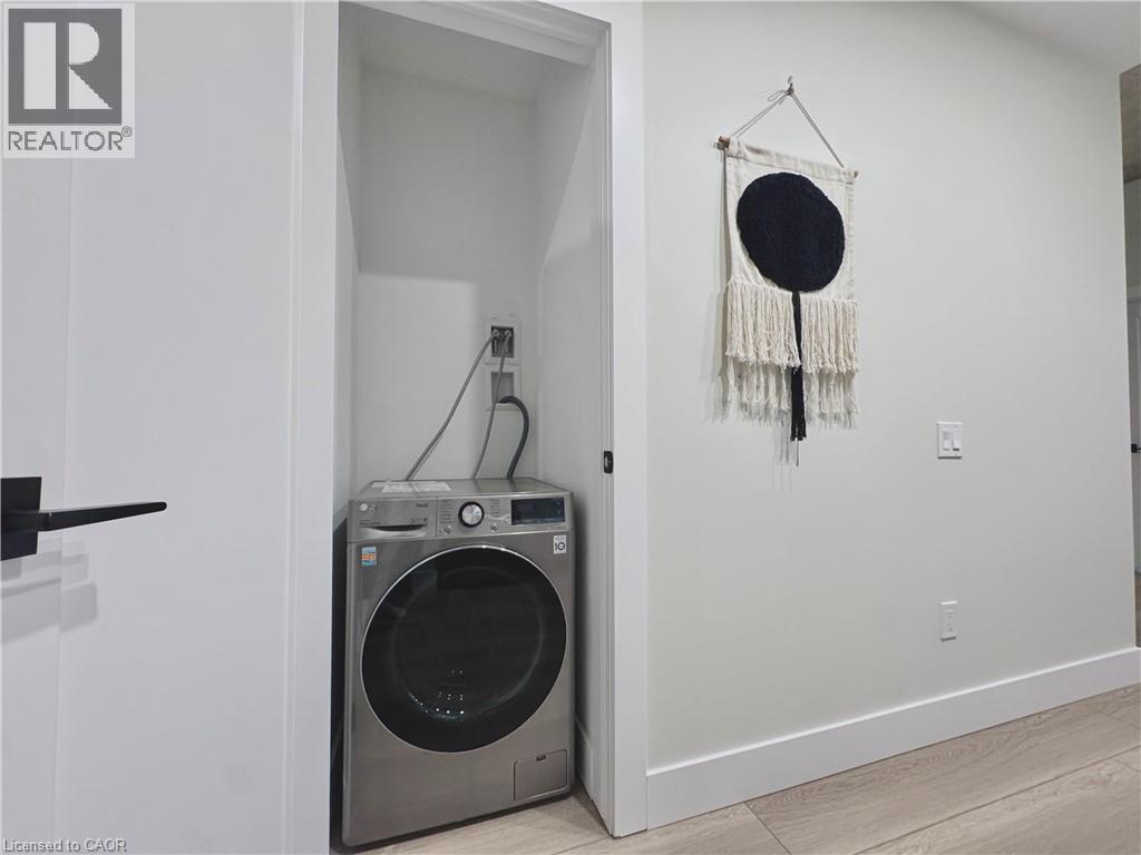 LG WASHER/DRYER COMBO ALL-IN-ONE - 169 James Street S Unit# 401, Hamilton, ON - Indoor Photo Showing Laundry Room