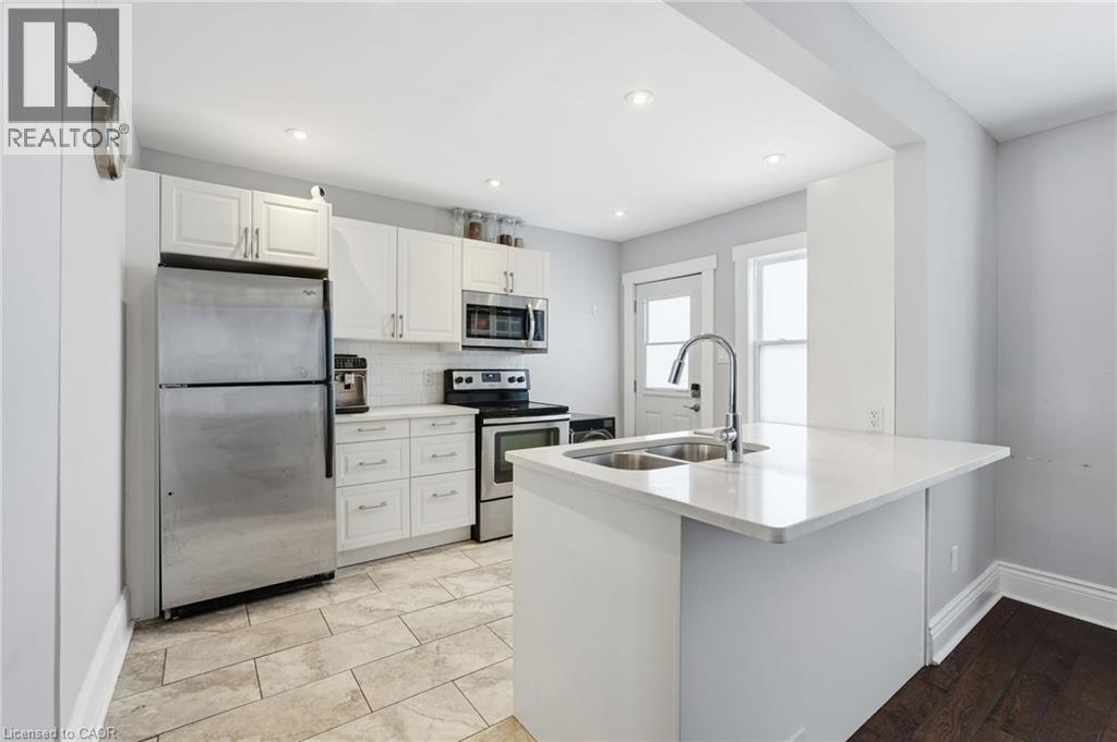 34 Balsam Avenue N, Hamilton, ON - Indoor Photo Showing Kitchen With Double Sink With Upgraded Kitchen