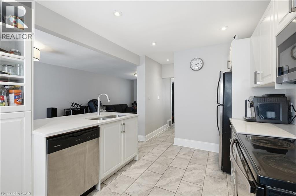 34 Balsam Avenue N, Hamilton, ON - Indoor Photo Showing Kitchen With Double Sink