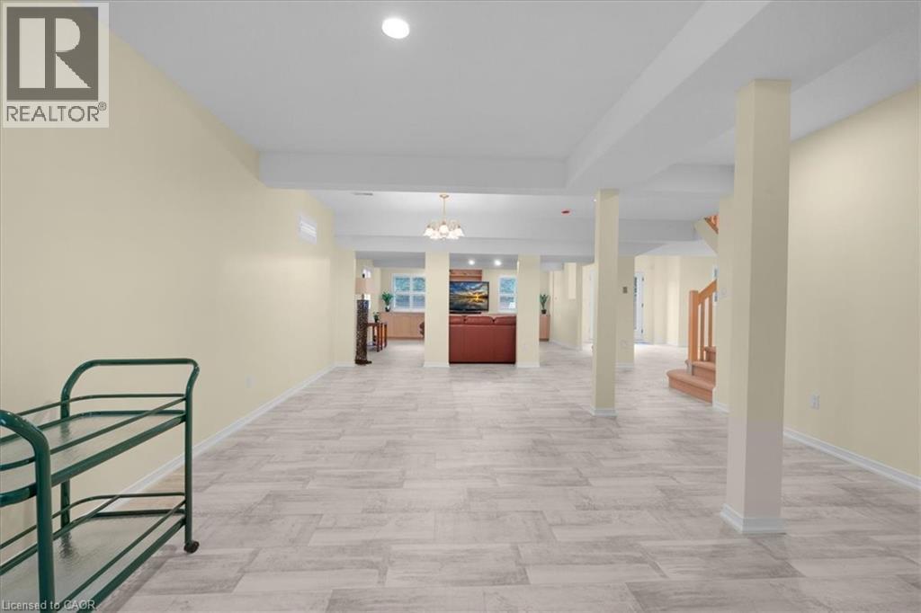 Hall featuring a chandelier, stairs, and recessed lighting - 90 Westlawn Drive, Hamilton, ON - Indoor Photo Showing Other Room