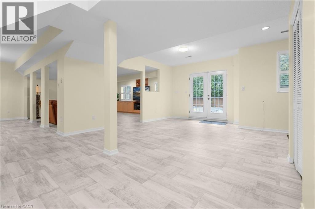 walkout from basement leading to backyard with double doors - 90 Westlawn Drive, Hamilton, ON - Indoor Photo Showing Other Room