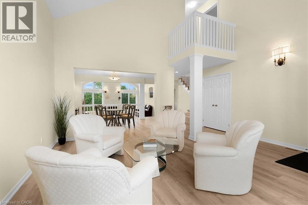Living area with high vaulted open to above ceiling - 90 Westlawn Drive, Hamilton, ON - Indoor Photo Showing Living Room