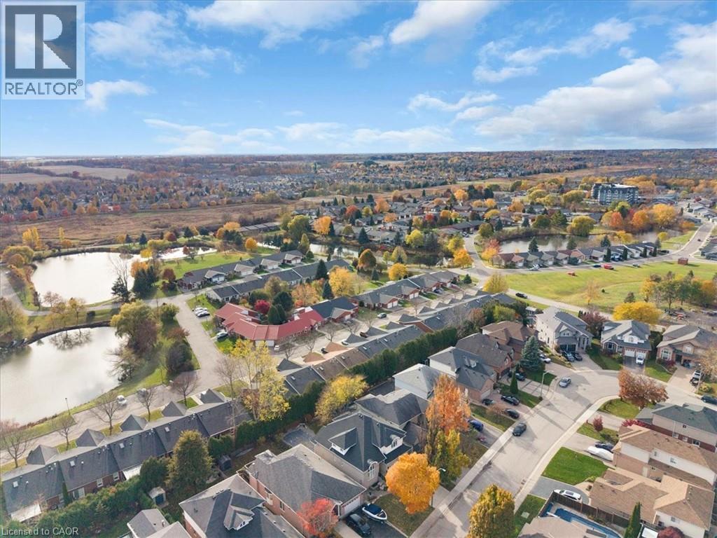 Aerial view of property's location with nearby suburban area and a large body of water - 90 Westlawn Drive, Hamilton, ON - Outdoor With View
