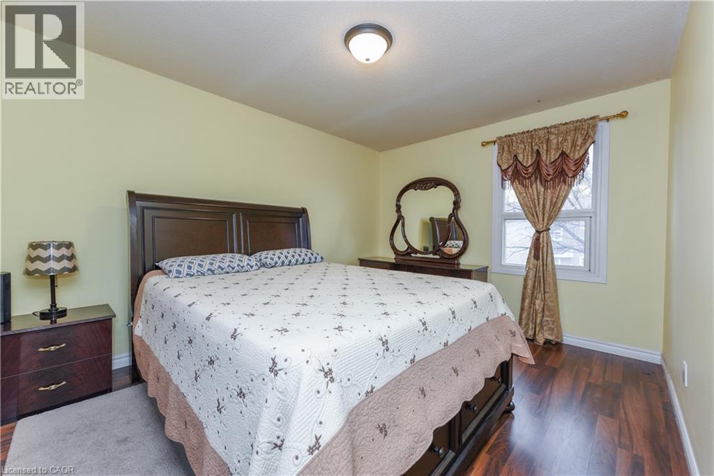 Bedroom with dark wood-type flooring - 85 Enmount Drive, Brampton, ON - Indoor Photo Showing Bedroom