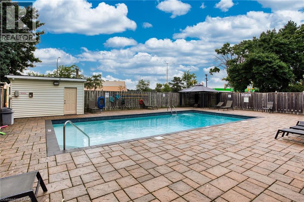 700 Dynes Road Unit# 616, Burlington, ON - Outdoor With In Ground Pool