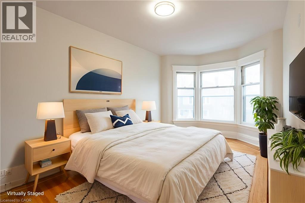 virtually staged - 17 Barnesdale Avenue N, Hamilton, ON - Indoor Photo Showing Bedroom