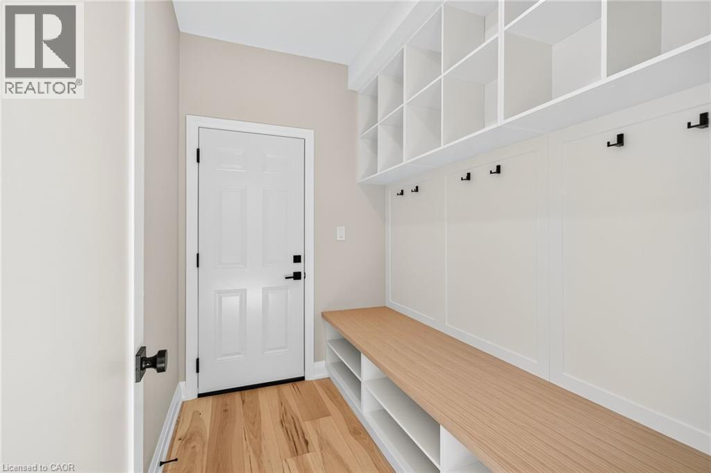 Mudroom featuring light wood-style floors and baseboards - 4006 Flemish Drive, Burlington, ON - Indoor Photo Showing Other Room