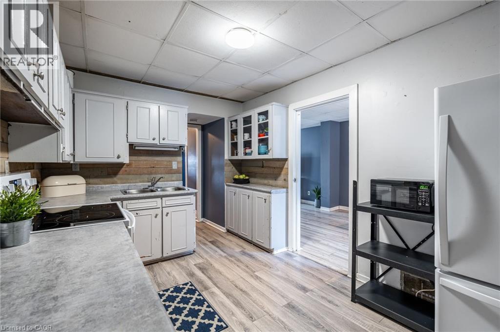52 Connaught Avenue N, Hamilton, ON - Indoor Photo Showing Kitchen With Double Sink