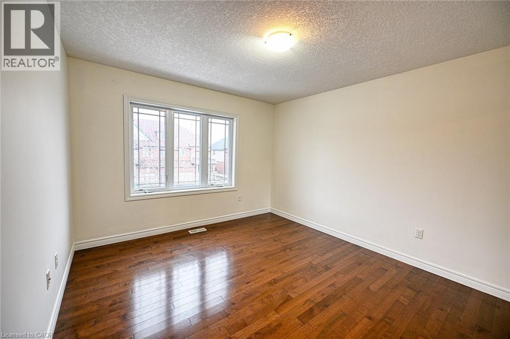 3rd - 130 Coopershawk Street, Kitchener, ON - Indoor Photo Showing Other Room