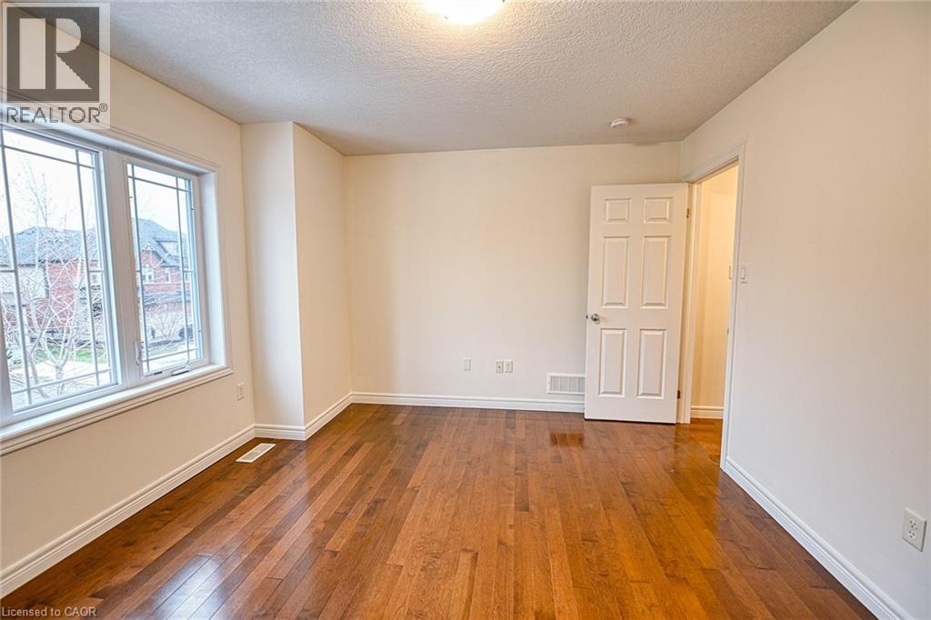 4th - 130 Coopershawk Street, Kitchener, ON - Indoor Photo Showing Other Room