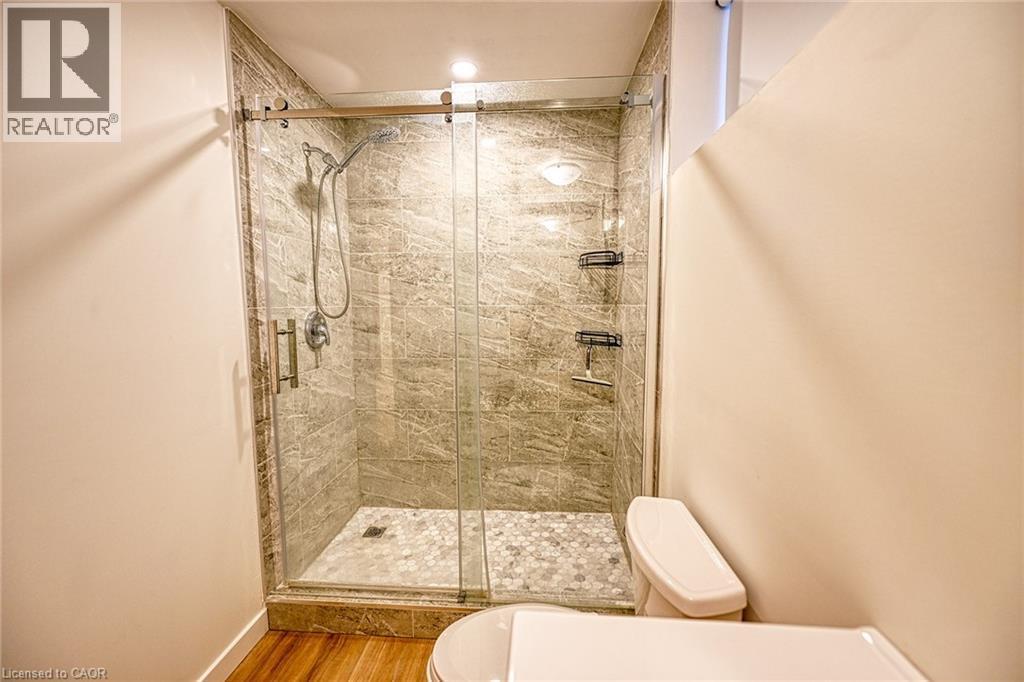 basement - 130 Coopershawk Street, Kitchener, ON - Indoor Photo Showing Bathroom