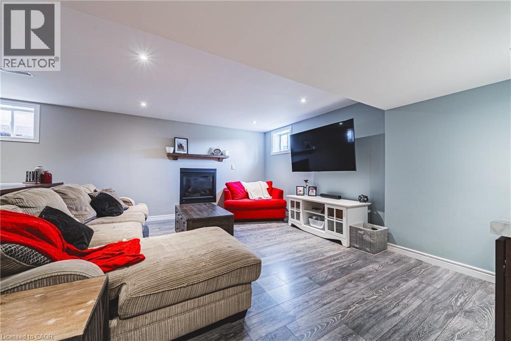 19 Liuna Court, Hamilton, ON - Indoor Photo Showing Living Room With Fireplace