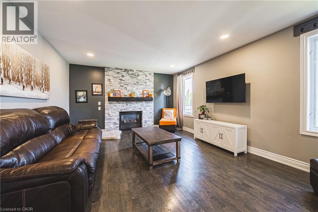19 Liuna Court, Hamilton, ON - Indoor Photo Showing Living Room With Fireplace