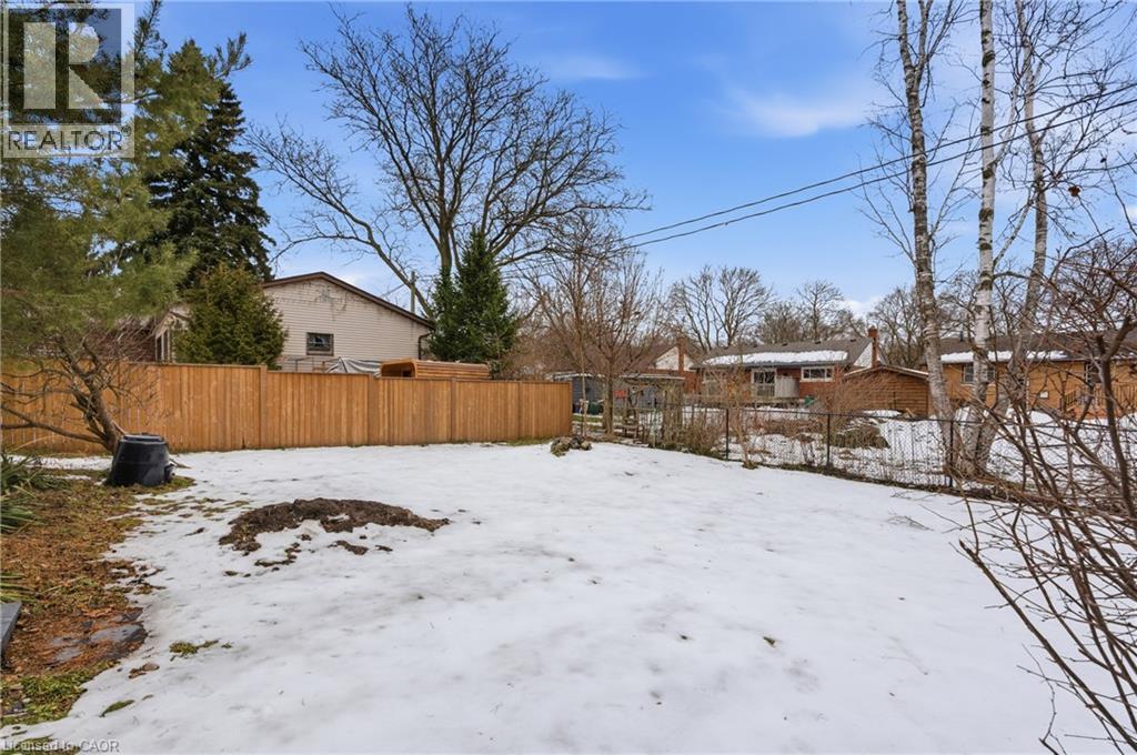 View of snowy yard - 157 Bridgeport Road E, Waterloo, ON - Outdoor