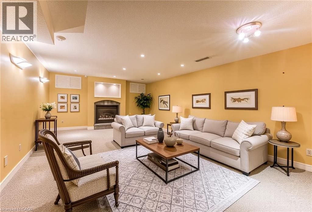 Virtually Staged - 2 Morningview Place, Kitchener, ON - Indoor Photo Showing Living Room With Fireplace