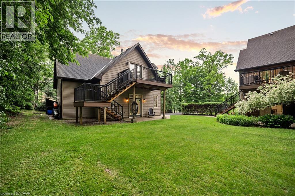 Outside view of guest quarters showcasing composite staircase and deck - 515 Hamilton Drive, Ancaster, ON - Outdoor With Deck Patio Veranda