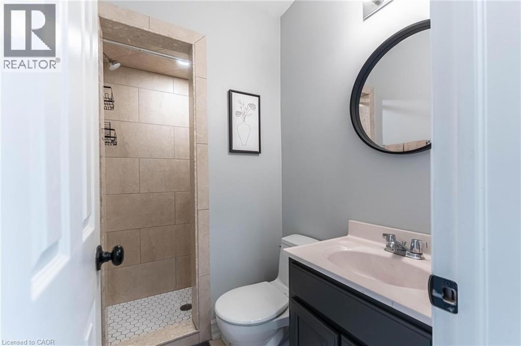 Full bathroom with vanity and a shower stall - 140 Royal Avenue, Hamilton, ON - Indoor Photo Showing Bathroom
