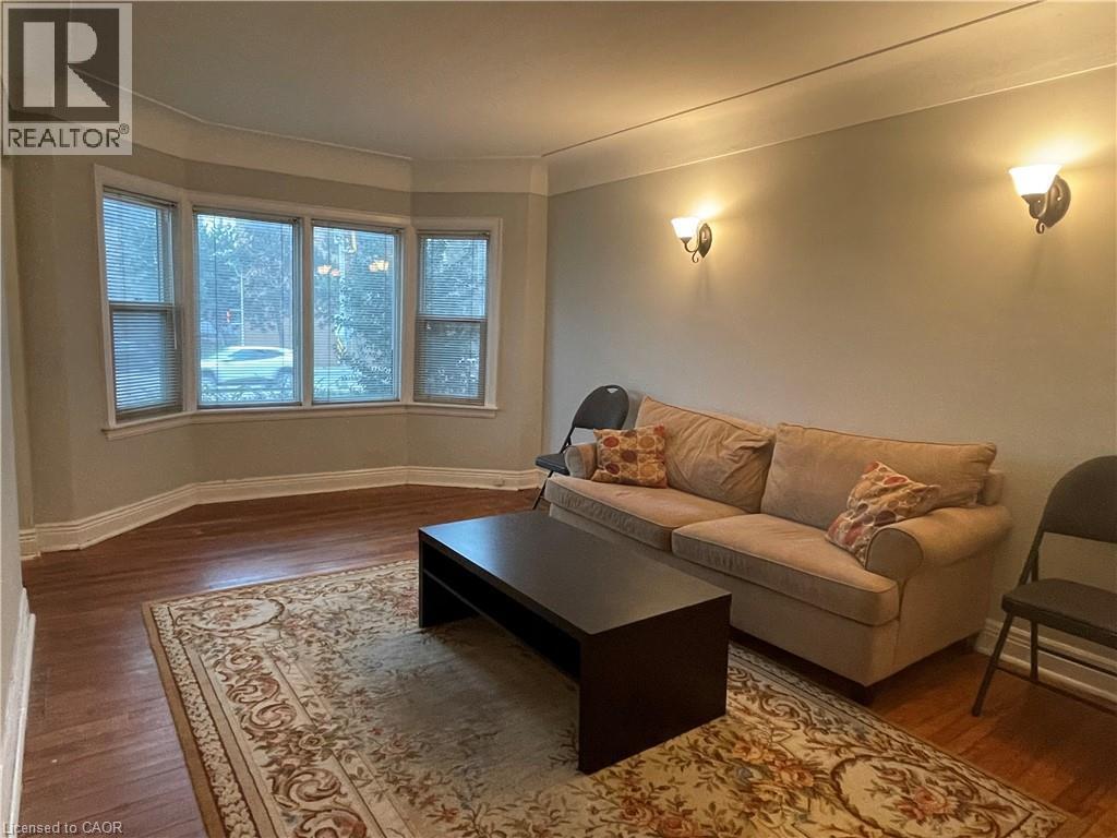 1028 Main Street W, Hamilton, ON - Indoor Photo Showing Living Room