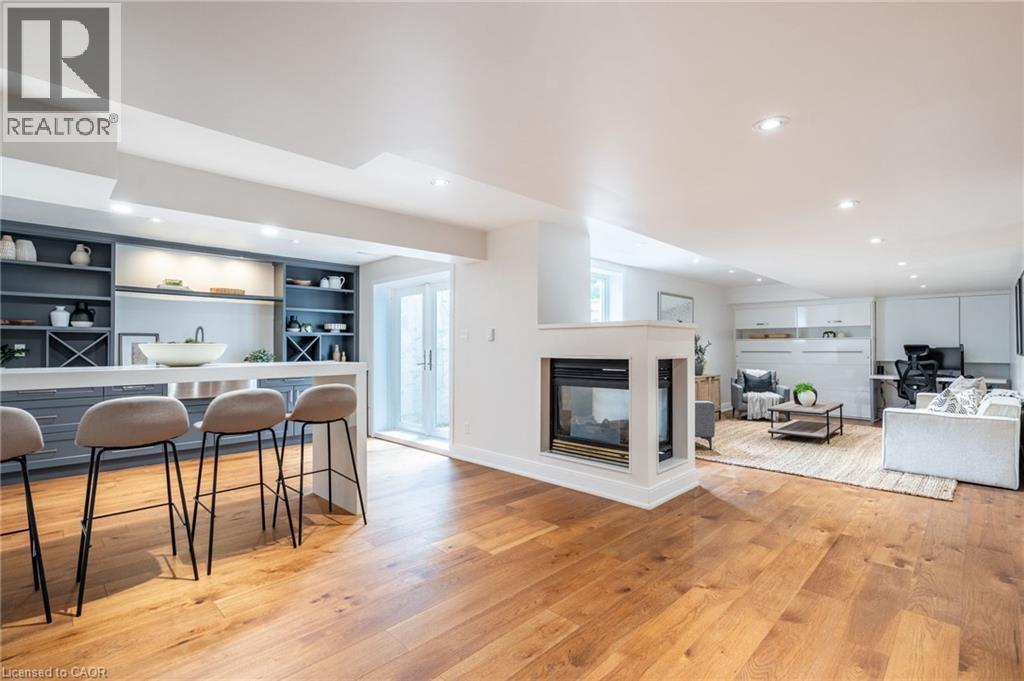 6618 Carriage Trail, Burlington, ON - Indoor With Fireplace