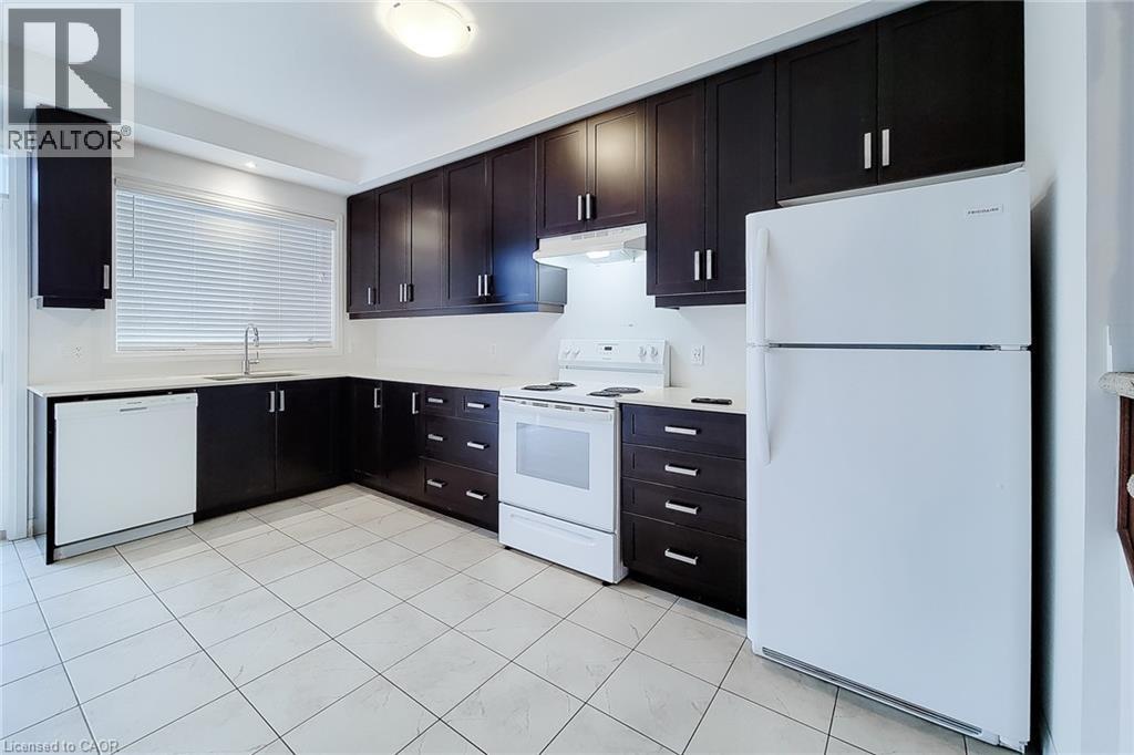 30 Times Square Boulevard Unit# 228, Stoney Creek, ON - Indoor Photo Showing Kitchen