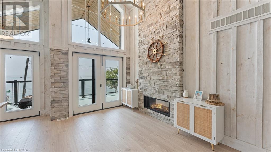 33 Cedar Drive, Turkey Point, ON - Indoor With Fireplace