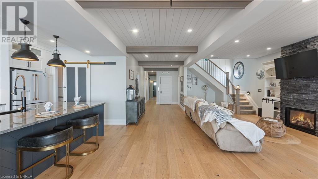 33 Cedar Drive, Turkey Point, ON - Indoor With Fireplace