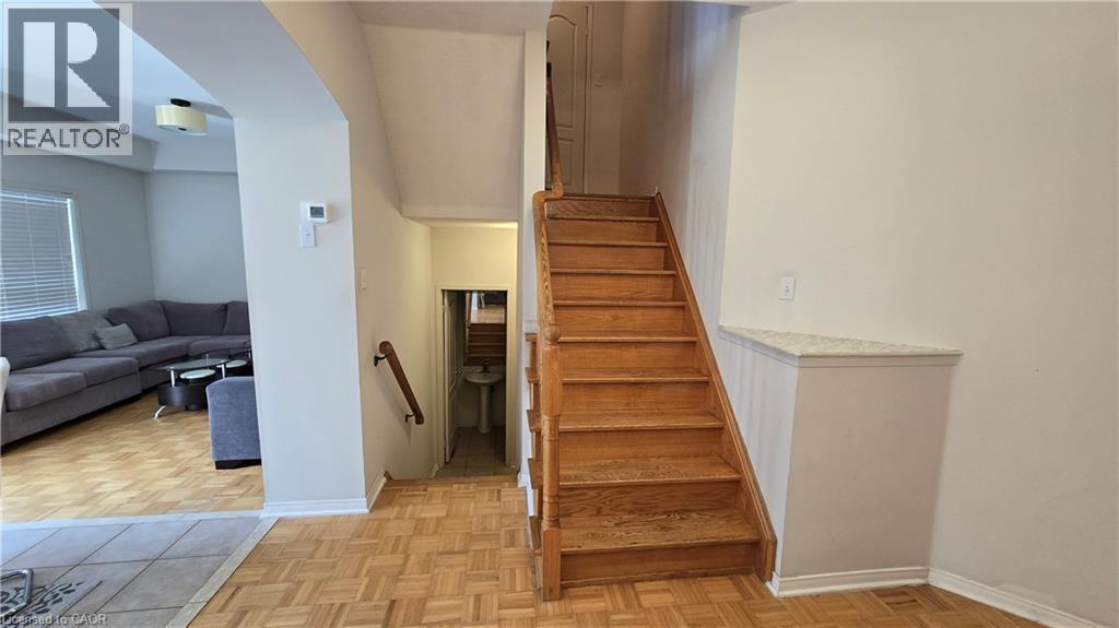 Stairway with parquet floors and arched walkways - 3688 Emery Drive, Mississauga, ON - Indoor Photo Showing Other Room