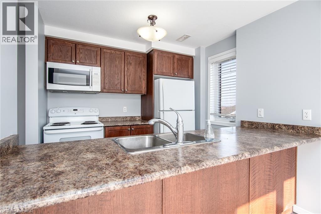 234 Rachel Crescent Unit# E, Kitchener, ON - Indoor Photo Showing Kitchen With Double Sink