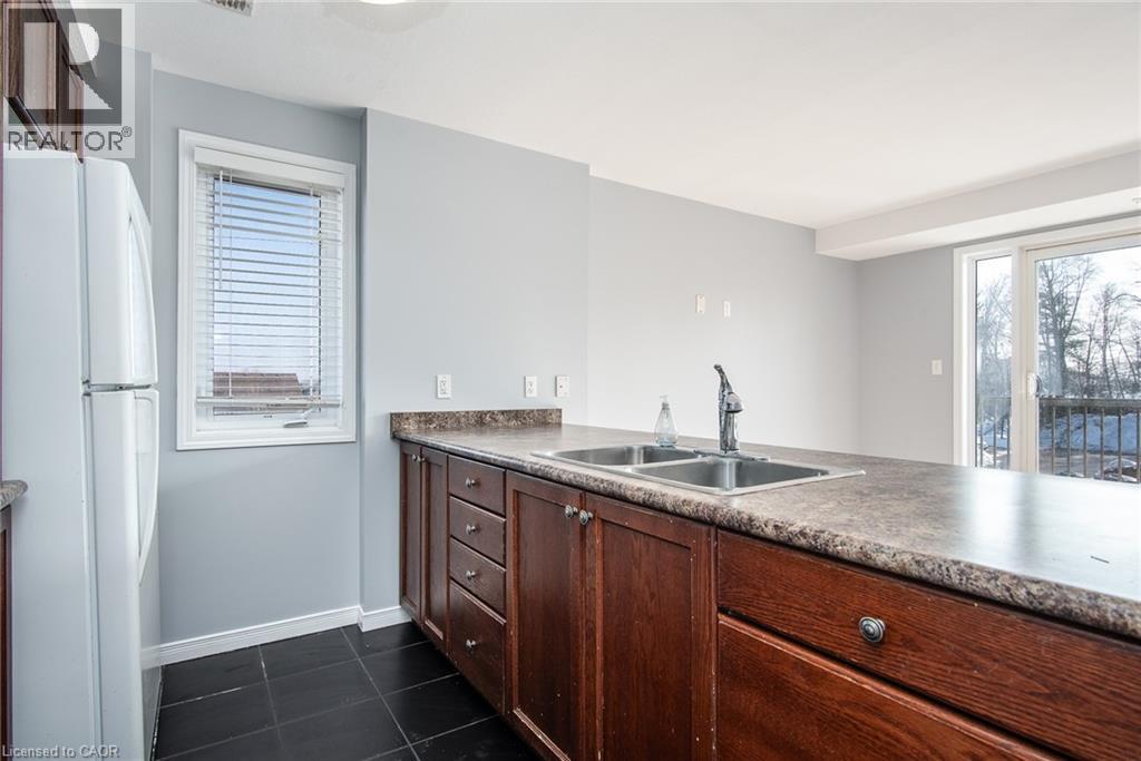 234 Rachel Crescent Unit# E, Kitchener, ON - Indoor Photo Showing Kitchen With Double Sink