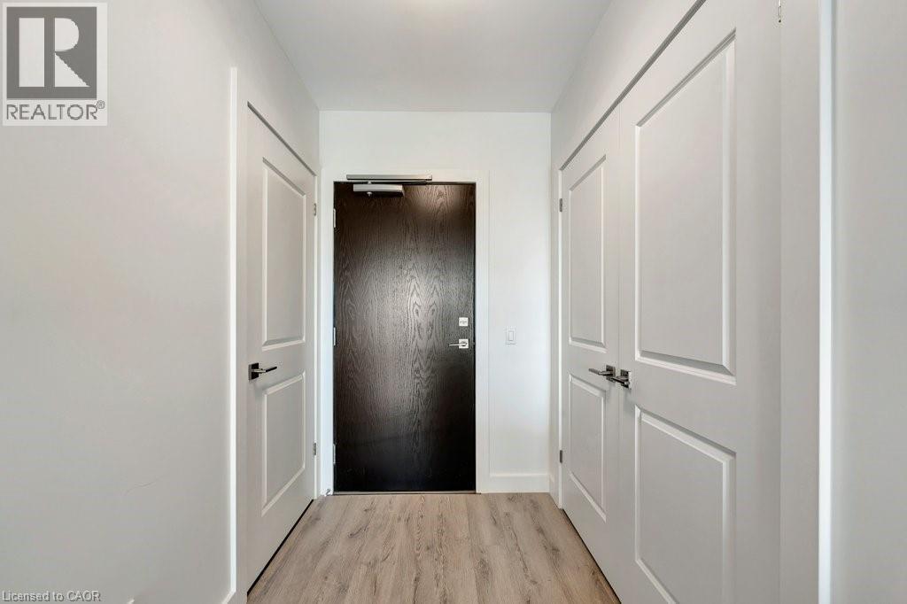 Hallway featuring light wood-style floors - 15 Glebe Street Unit# 1511, Cambridge, ON - Indoor Photo Showing Other Room