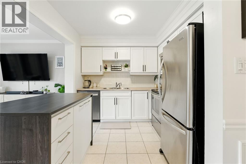 247 Fall Fair Way, Binbrook, ON - Indoor Photo Showing Kitchen With Stainless Steel Kitchen With Double Sink