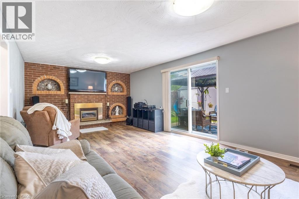 63 Lionsgate Avenue, Hamilton, ON - Indoor Photo Showing Living Room With Fireplace