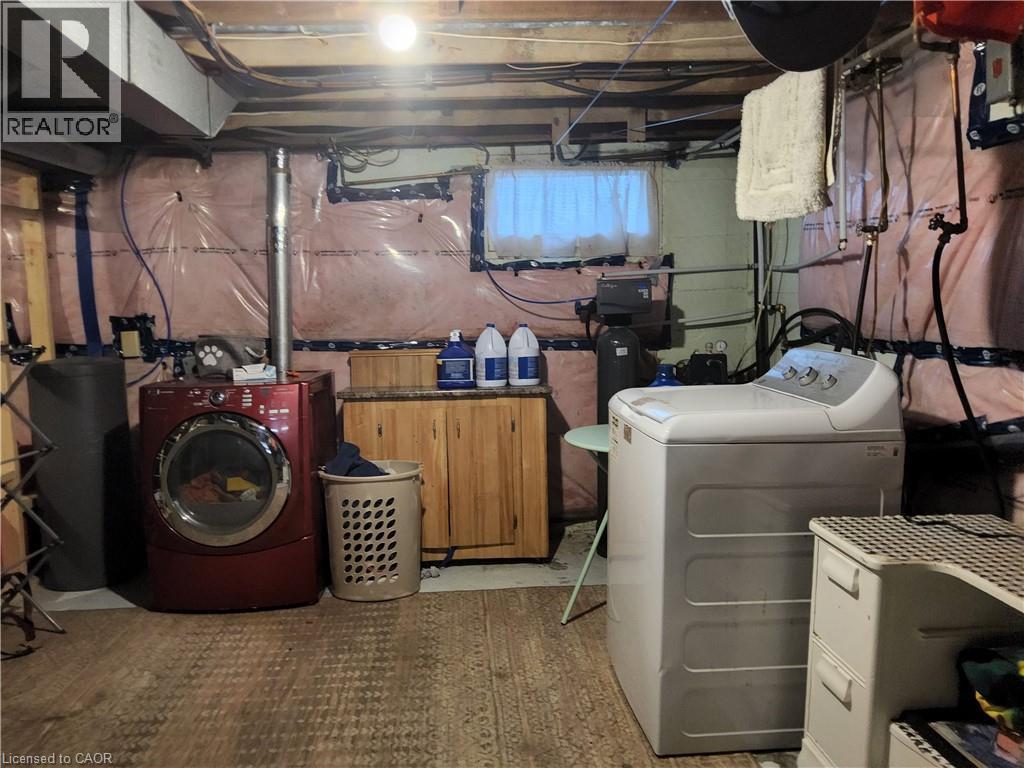 Utility area with washer and clothes dryer - 509 Queensway W, Simcoe, ON - Indoor Photo Showing Laundry Room