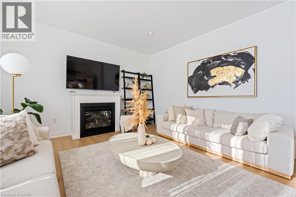 66 Cesar Place, Ancaster, ON - Indoor Photo Showing Living Room With Fireplace