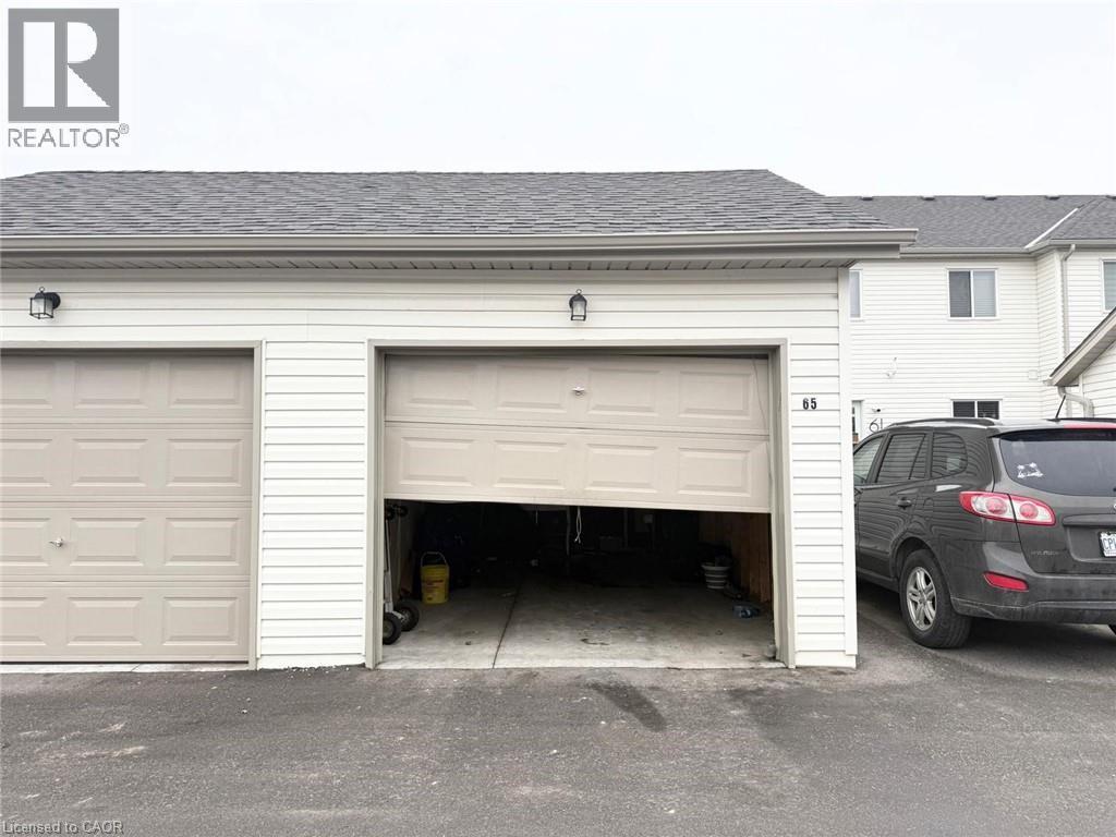 View of garage - 65 Old School Trail Unit# 36, Welland, ON - Outdoor With Exterior
