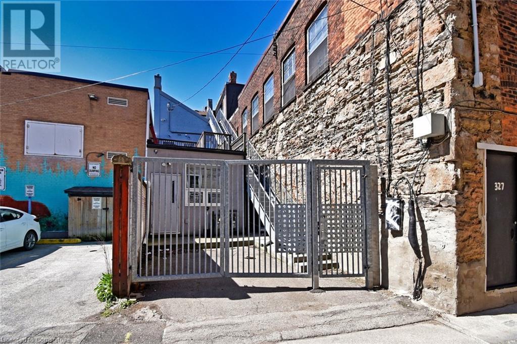 View of gate - 329 King Street E Unit# 3, Hamilton, ON - Outdoor