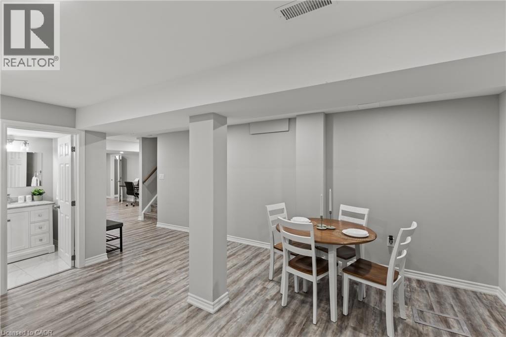 Dining space featuring light wood-style flooring and stairway - 62 Esther Crescent Unit# Lower, Thorold, ON - Indoor Photo Showing Dining Room