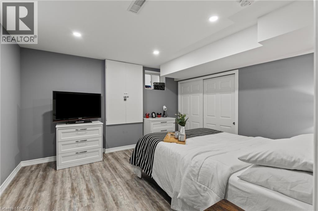 Bedroom featuring a closet, light wood finished floors, and recessed lighting - 62 Esther Crescent Unit# Lower, Thorold, ON - Indoor Photo Showing Bedroom