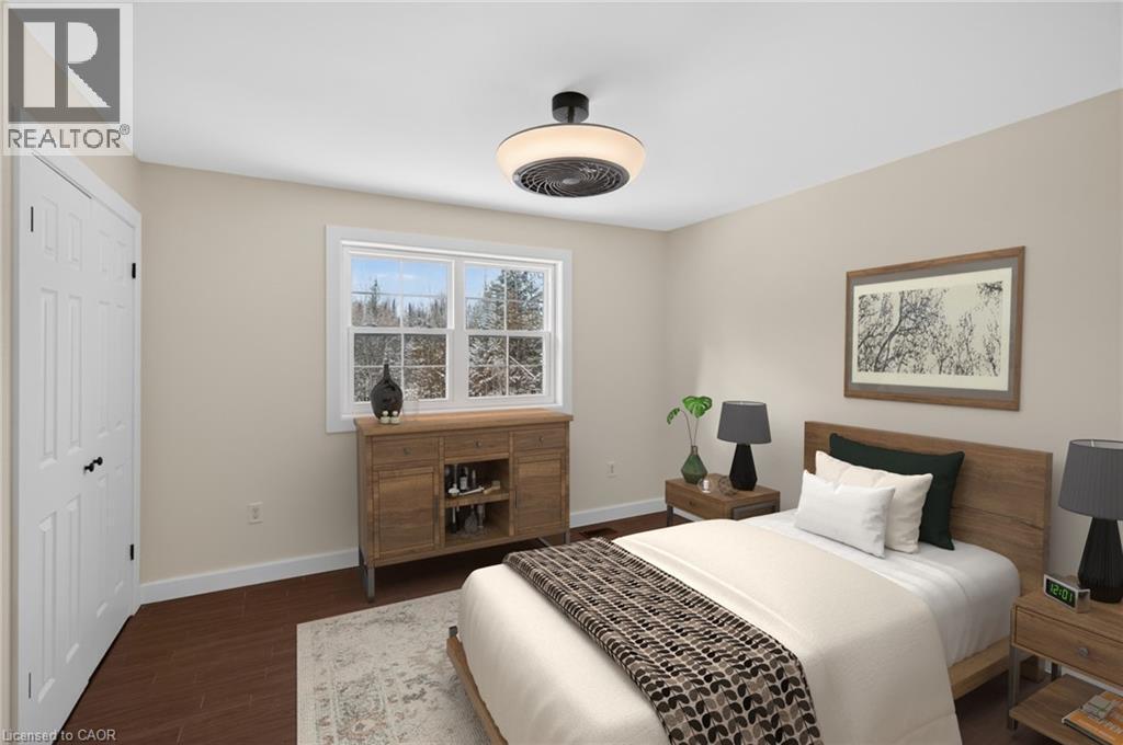 virtually staged bedroom 1 - 7460 5Th Line, Essa, ON - Indoor Photo Showing Bedroom