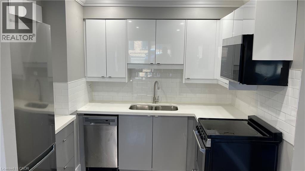 700 Lawrence Road Unit# 102, Hamilton, ON - Indoor Photo Showing Kitchen With Double Sink With Upgraded Kitchen