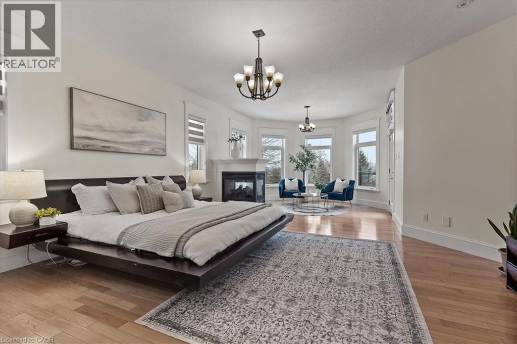 86 Canters Close, Kitchener, ON - Indoor Photo Showing Bedroom With Fireplace