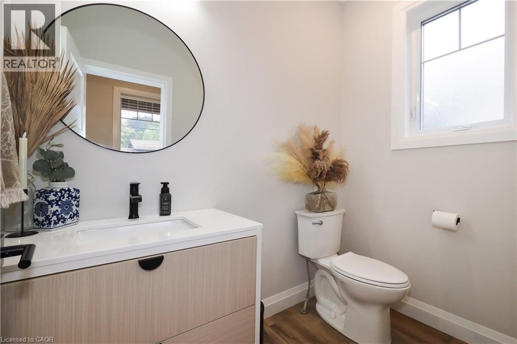 Bathroom with vanity and dark wood finished floors - 238 Eagle Street S, Cambridge, ON - Indoor Photo Showing Bathroom