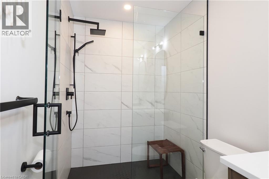 Bathroom with a walk in shower and vanity - 238 Eagle Street S, Cambridge, ON - Indoor Photo Showing Bathroom