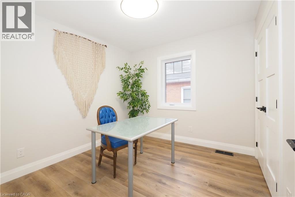 Office area with light wood finished floors - 238 Eagle Street S, Cambridge, ON - Indoor