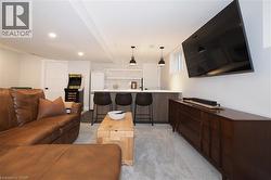 Living room with light colored carpet -