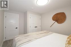 Bedroom featuring carpet floors and a closet -