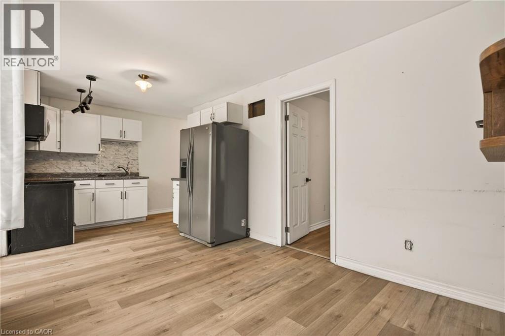 Living Room/Kitchen - 218 East 8Th Street, Hamilton, ON - Indoor Photo Showing Kitchen