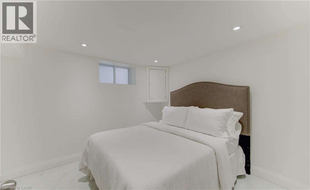 Bedroom featuring baseboards and recessed lighting - 569 Stirling Avenue S, Kitchener, ON - Indoor Photo Showing Bedroom
